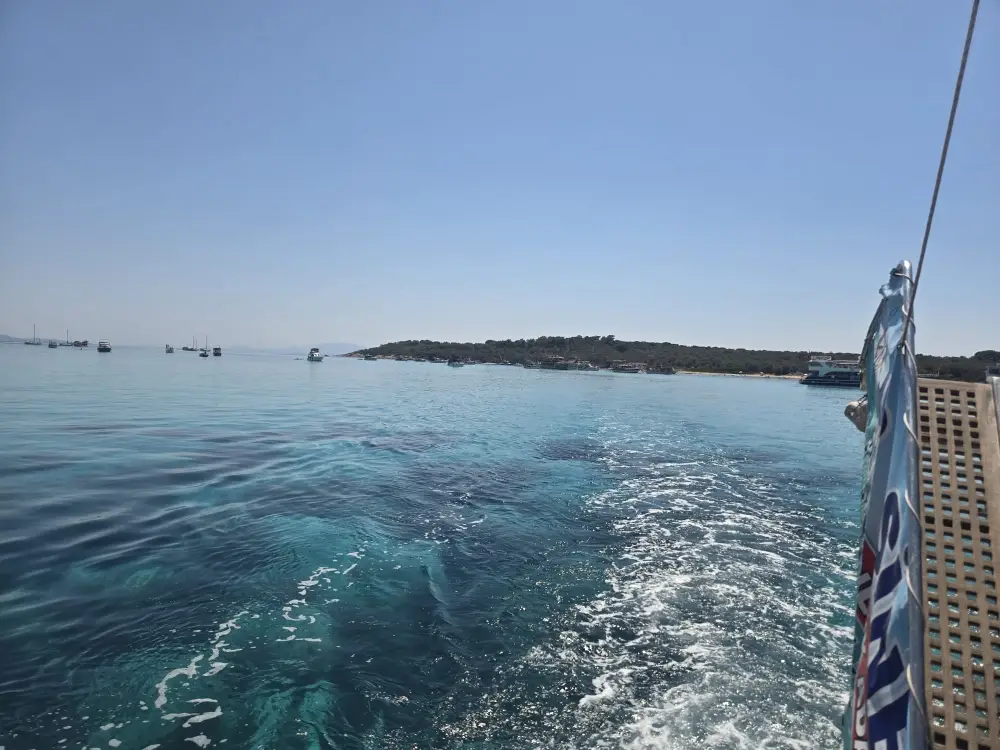 JR Sinbad Dikili Boat Tour: Four Bays, Swimming, Lunch and Music image 2