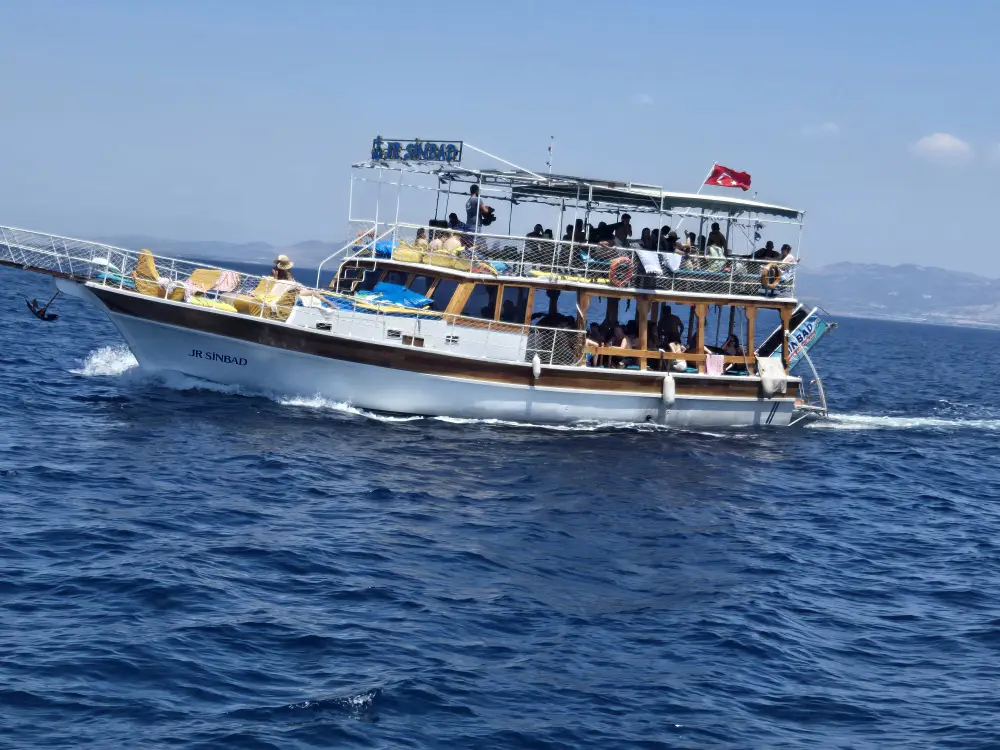 JR Sinbad Dikili Boat Tour: Four Bays, Swimming, Lunch and Music image 1