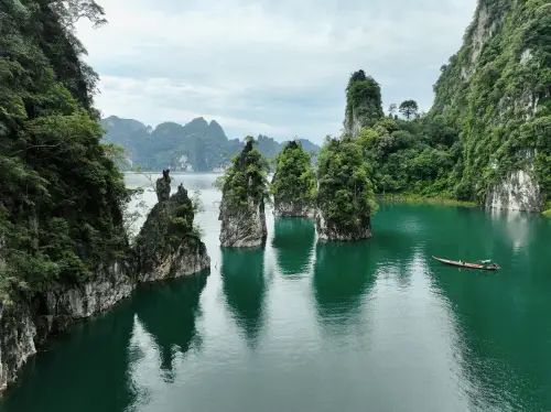 Cheow Lan Lake Scenic Longtail Boat Tour Khao Sam Kloe & Floating Raft House Experience