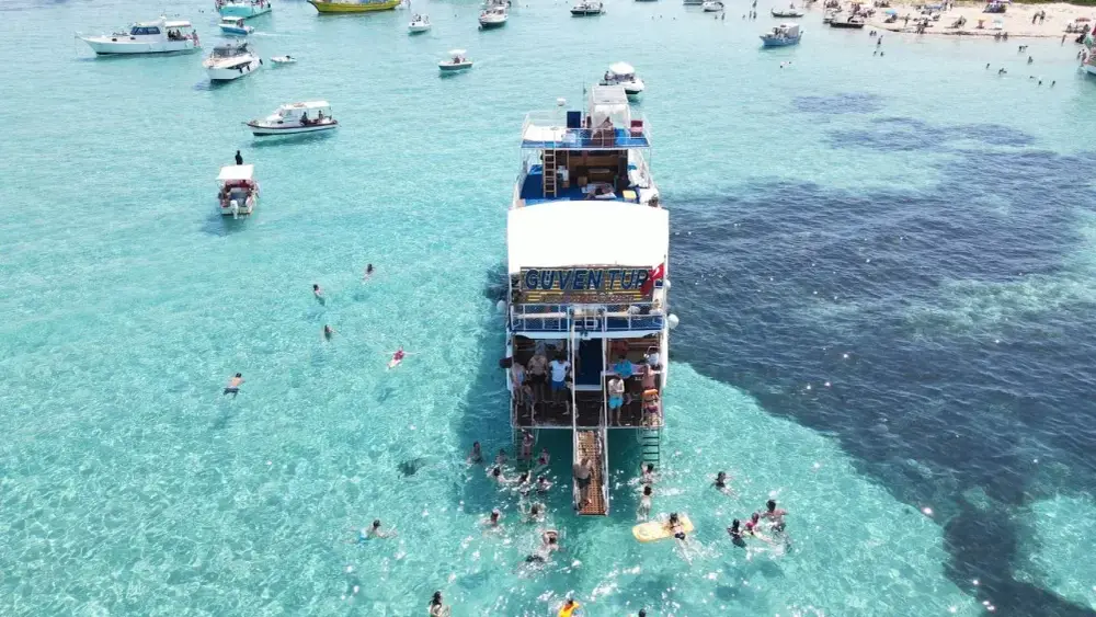 Dikili Four-Bay Full-Day Boat Tour with Lunch by Güven Tur image 1