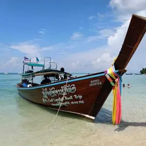 Mr. Chet Longtail Boat Trip | Phi Phi Island logo