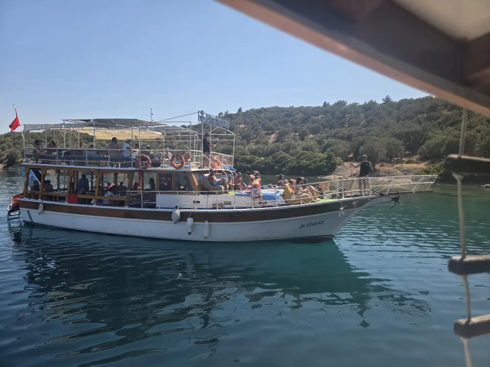 JR Sinbad Dikili Boat Tour: Four Bays, Swimming, Lunch and Music image 3